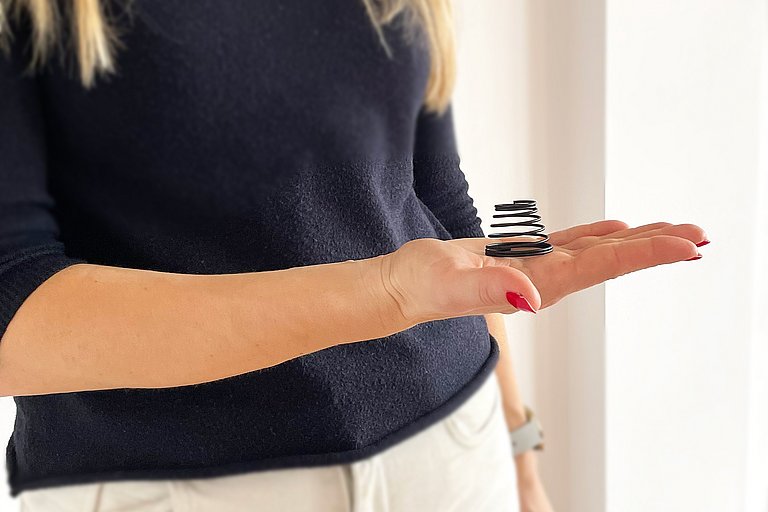 Arcuri elicoidale conice